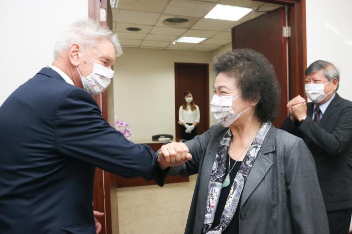 CY President Chu Chen greets French Senator Alain Richard with a Covid-safe elbow bum